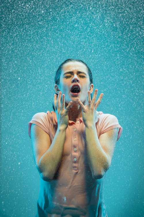 portrait-young-beautiful-woman-rain